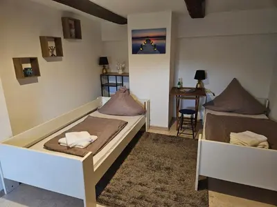 Ein Bett oder Betten in einem Zimmer der Unterkunft Bierstübchen Heiningen