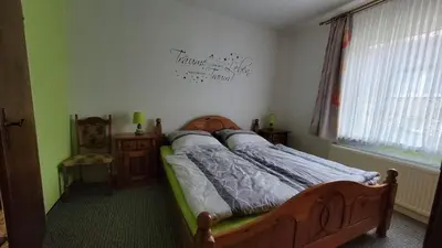 Ein Bett oder Betten in einem Zimmer der Unterkunft Oleander
