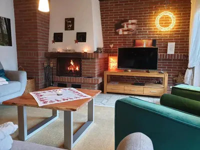 Ein Sitzbereich in der Unterkunft Villa Rose
