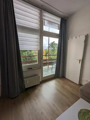 Ein Bett oder Betten in einem Zimmer der Unterkunft Ferienwohnung Obere Bergstraße