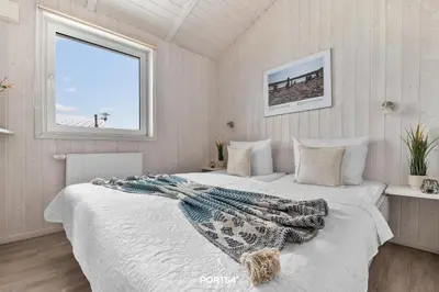 Ein Bett oder Betten in einem Zimmer der Unterkunft Ferienhaus Bergquartier - Sankt Andreasberg im Harz