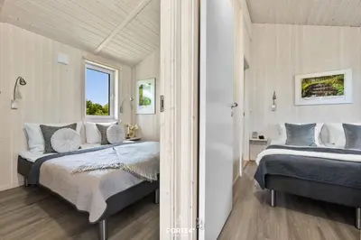 Ein Bett oder Betten in einem Zimmer der Unterkunft Ferienhaus Fernblick - Sankt Andreasberg im Harz
