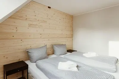 Ein Bett oder Betten in einem Zimmer der Unterkunft Harzchalet Brockenbahn 2B