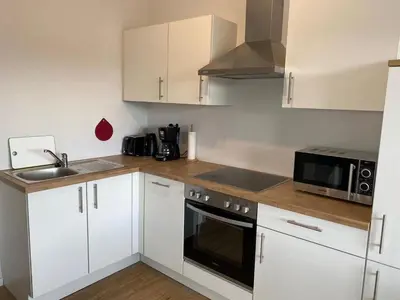 Küche/Küchenzeile in der Unterkunft Herzchalet Carl