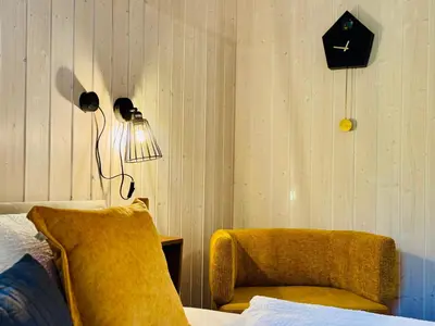 Ein Bett oder Betten in einem Zimmer der Unterkunft Ferienhaus Trollblume - Sankt Andreasberg im Harz