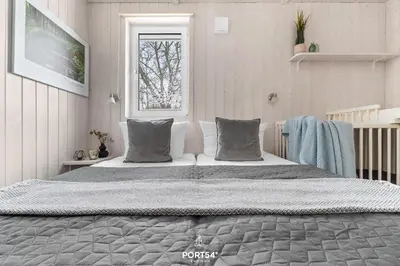 Ein Bett oder Betten in einem Zimmer der Unterkunft Ferienhaus Waldpalast - Sankt Andreasberg im Harz