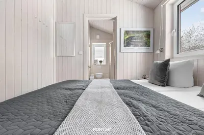 Ein Bett oder Betten in einem Zimmer der Unterkunft Ferienhaus Harzer Blick - Sankt Andreasberg im Harz