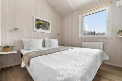 Ein Bett oder Betten in einem Zimmer der Unterkunft Ferienhaus Panoramapark 46 - Sankt Andreasberg im Harz
