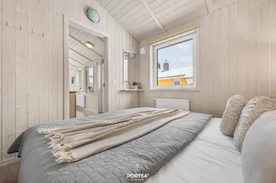 Ein Bett oder Betten in einem Zimmer der Unterkunft Ferienhaus Brocken - Sankt Andreasberg im Harz