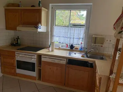 Küche/Küchenzeile in der Unterkunft Rollstuhlgerechter Ferienbungalow in ruhiger Lage