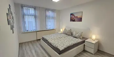 Ein Bett oder Betten in einem Zimmer der Unterkunft FeWo Rügenblick