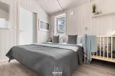 Ein Bett oder Betten in einem Zimmer der Unterkunft Ferienhaus Panoramablick 7 - Sankt Andreasberg im Harz