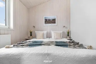 Ein Bett oder Betten in einem Zimmer der Unterkunft Ferienhaus Harzchen 49 - Sankt Andreasberg im Harz