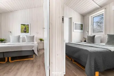 Ein Bett oder Betten in einem Zimmer der Unterkunft Ferienhaus Sonnenaufgang - Sankt Andreasberg im Harz