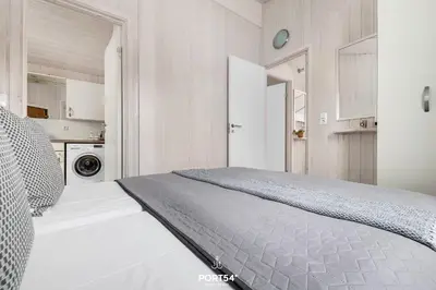 Ein Bett oder Betten in einem Zimmer der Unterkunft Ferienhaus Sonnenaufgang - Sankt Andreasberg im Harz