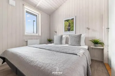 Ein Bett oder Betten in einem Zimmer der Unterkunft Ferienhaus Panoramablick 29 - Sankt Andreasberg im Harz