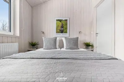Ein Bett oder Betten in einem Zimmer der Unterkunft Ferienhaus Sonnenschein - St Andreasberg im Harz