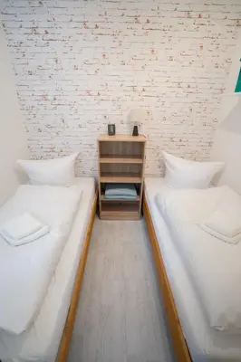 Ein Bett oder Betten in einem Zimmer der Unterkunft Harzliebe Vier Jahreszeiten