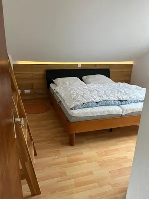 Ein Bett oder Betten in einem Zimmer der Unterkunft Harzhaus Altenau - Wohnung 3