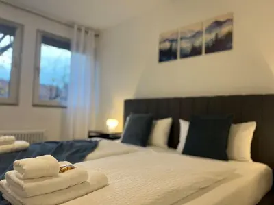 Ein Bett oder Betten in einem Zimmer der Unterkunft Stillvolle & komfortable Ferienwohnung im Zentrum