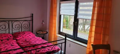 Ein Bett oder Betten in einem Zimmer der Unterkunft FeWo Harz Haennig 1