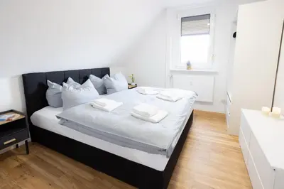 Ein Bett oder Betten in einem Zimmer der Unterkunft Brockenoase Fullhouse