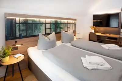 Ein Bett oder Betten in einem Zimmer der Unterkunft Lieblingsquartier Wohnung 12