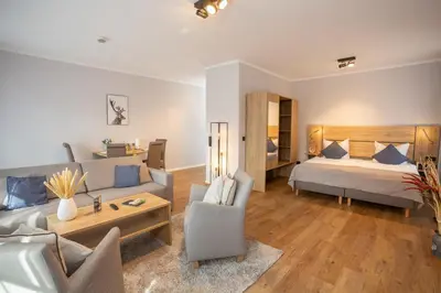 Ein Bett oder Betten in einem Zimmer der Unterkunft Chalet Bergzeit 6