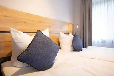 Ein Bett oder Betten in einem Zimmer der Unterkunft Chalet Bergzeit 6