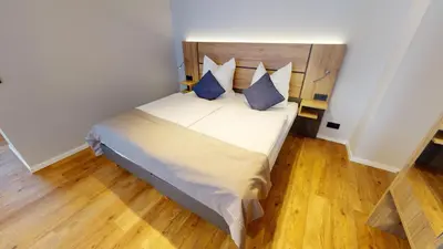 Ein Bett oder Betten in einem Zimmer der Unterkunft Chalet Bergzeit 5