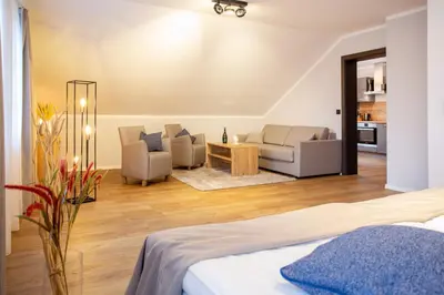 Ein Bett oder Betten in einem Zimmer der Unterkunft Chalet Bergzeit 3