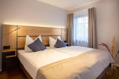 Ein Bett oder Betten in einem Zimmer der Unterkunft Chalet Bergzeit 3