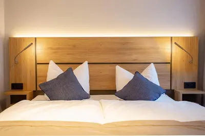 Ein Bett oder Betten in einem Zimmer der Unterkunft Chalet Bergzeit 3