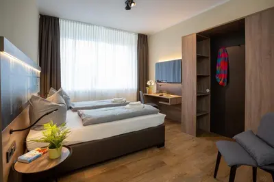 Ein Bett oder Betten in einem Zimmer der Unterkunft Lieblingsquartier Wohnung 1