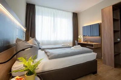 Ein Bett oder Betten in einem Zimmer der Unterkunft Lieblingsquartier Wohnung 1
