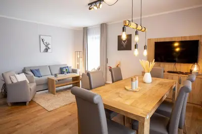 Ein Sitzbereich in der Unterkunft Chalet Bergzeit 7