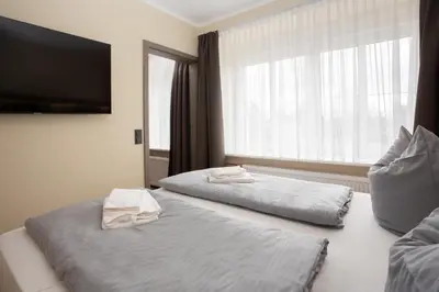 Ein Bett oder Betten in einem Zimmer der Unterkunft Lieblingsquartier St Andreasberg Wohnung 8