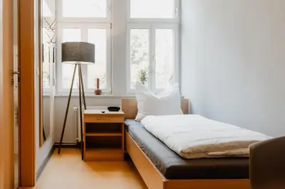 Ein Bett oder Betten in einem Zimmer der Unterkunft Am großen Bleek Villa Gartenblick