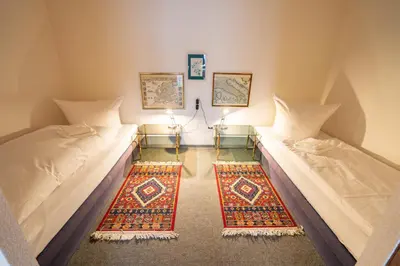 Ein Bett oder Betten in einem Zimmer der Unterkunft Zinnie