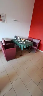 Ein Sitzbereich in der Unterkunft Suite Rübezahl