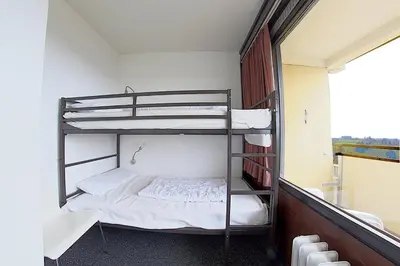 Ein Bett oder Betten in einem Zimmer der Unterkunft Apartment 474