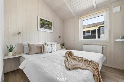 Ein Bett oder Betten in einem Zimmer der Unterkunft Ferienhaus Fuchsbau - St Andreasberg im Harz