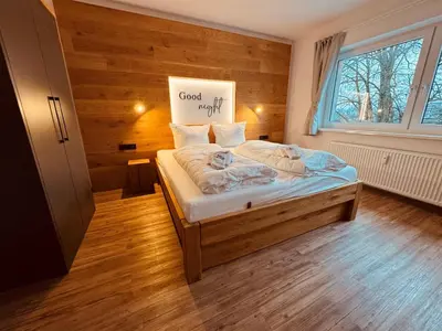Ein Bett oder Betten in einem Zimmer der Unterkunft Baude IV