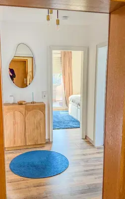 Ein Bett oder Betten in einem Zimmer der Unterkunft FeWo DT ''Bismarck'' mit traumhafter Balkonaussicht