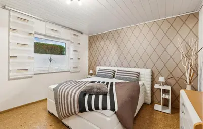 Ein Bett oder Betten in einem Zimmer der Unterkunft Pet Friendly Home In Bad Harzburg