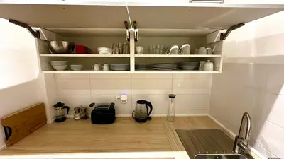 Küche/Küchenzeile in der Unterkunft Apartment Mauerblick in der Altstadt mit Smart TV Waschtrockner und voll ausgestatteter Küche