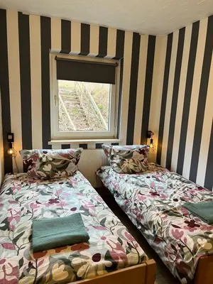 Ein Bett oder Betten in einem Zimmer der Unterkunft Ferienhaus Denise Harz