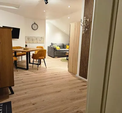 Ein Bett oder Betten in einem Zimmer der Unterkunft Ferienapartment am Rosenberg