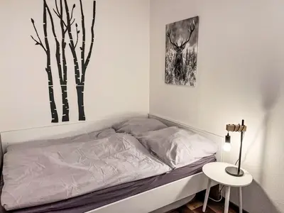 Ein Bett oder Betten in einem Zimmer der Unterkunft Apartment Elwi by Interhome