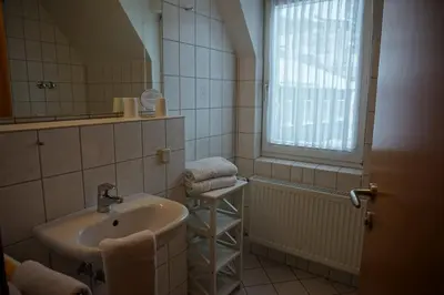 Ein Badezimmer in der Unterkunft Hotel Berliner Hof
